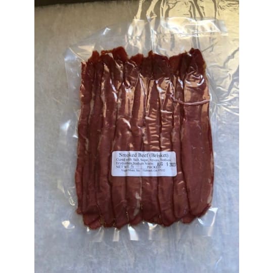 Beef Bacon - Our beef bacon is made from smoked brisket. You can buy this by the slab or sliced. 