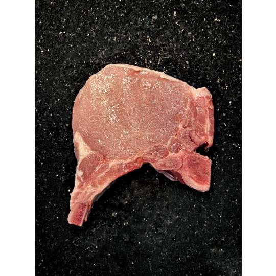 Bone-In Pork Chops - Bone In, Flavorful Pork Chops just beggin' to be seasoned, grilled, and plated on your dinner table. 4/pkg  Ordered in 1.75 lb increments. For example, if you order a quantity of 2, you will receive 3.5 lb.  Price per pound is $3.99.