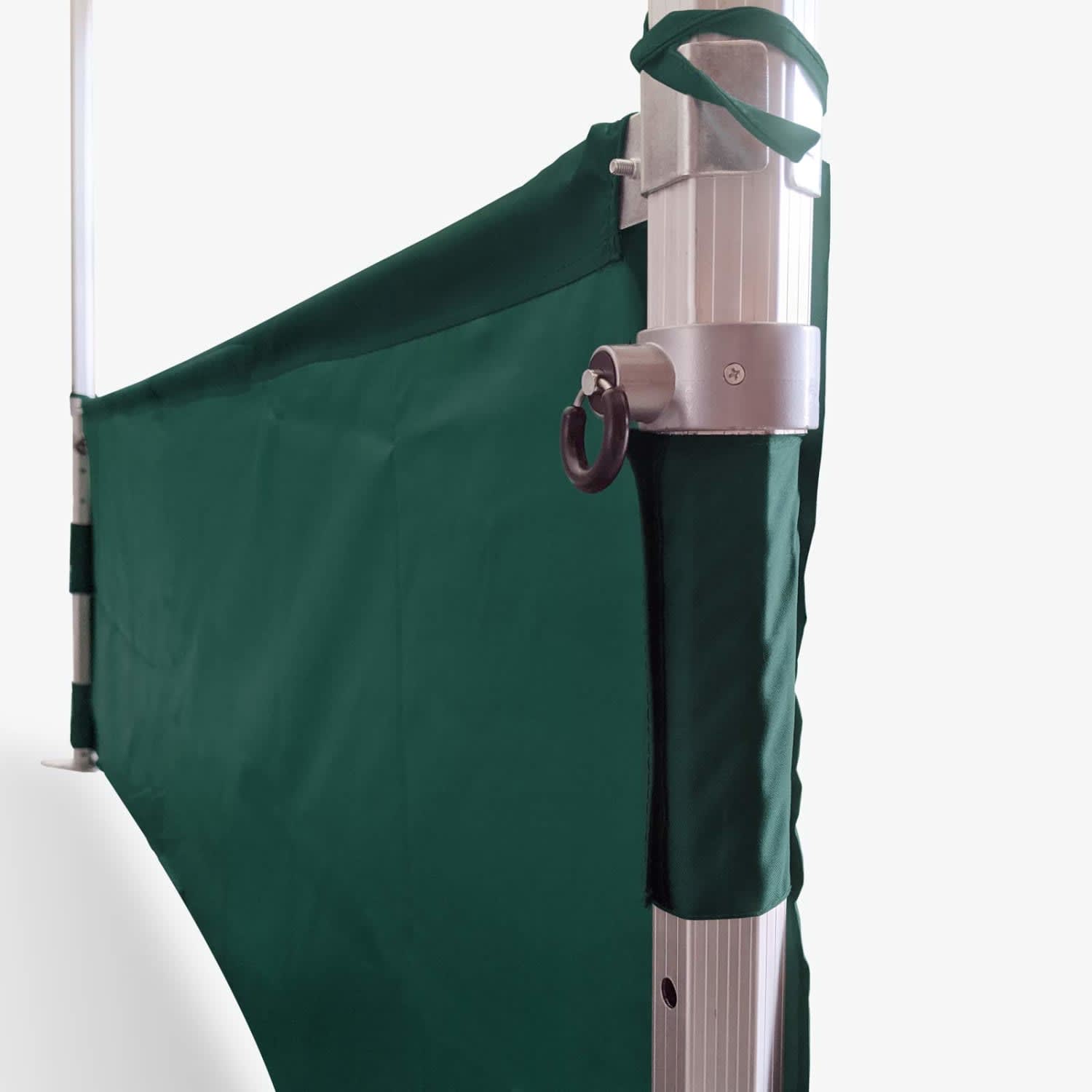 A green half wall kit for marquees, featuring fabric attached to a silver pole with a clip.