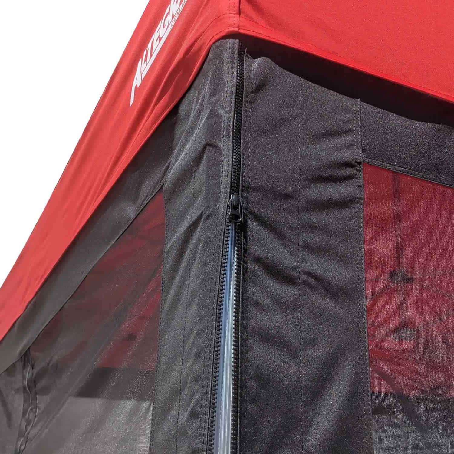 A red gazebo featuring solid black walls with a zipper detail, designed for exhibitions and events.