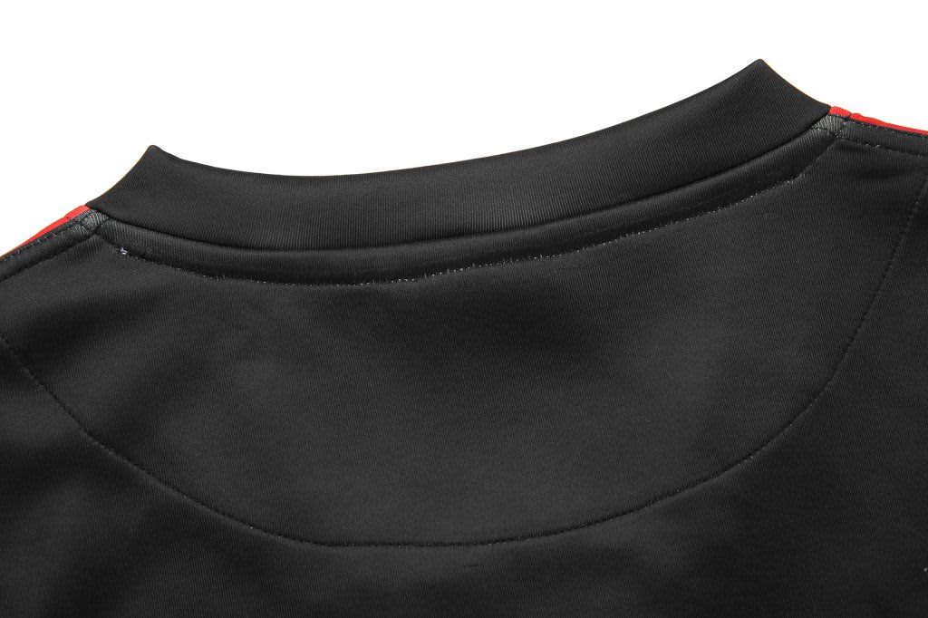 A black AFL singlet featuring red accents, with a round neckline and a logo on the back.