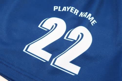 A blue sports uniform jersey featuring a large white number "22" and a space for a player's name. Includes a logo.