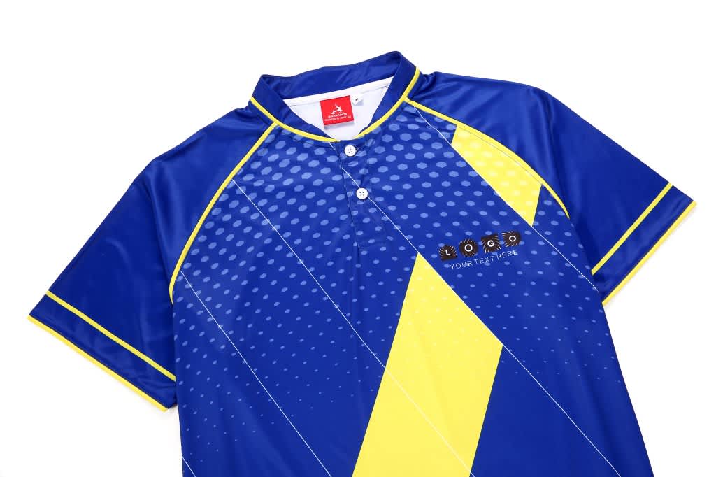 A blue and yellow polo shirt with a patterned design and a logo on the left chest area.