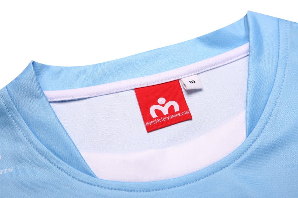 A light blue football vest featuring a label with a logo. The neckline is white and the fabric appears lightweight.