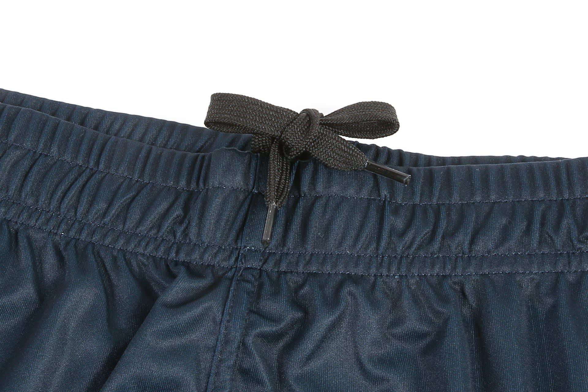 Dark navy volleyball uniform shorts featuring an elastic waistband with a drawstring. The material appears smooth.