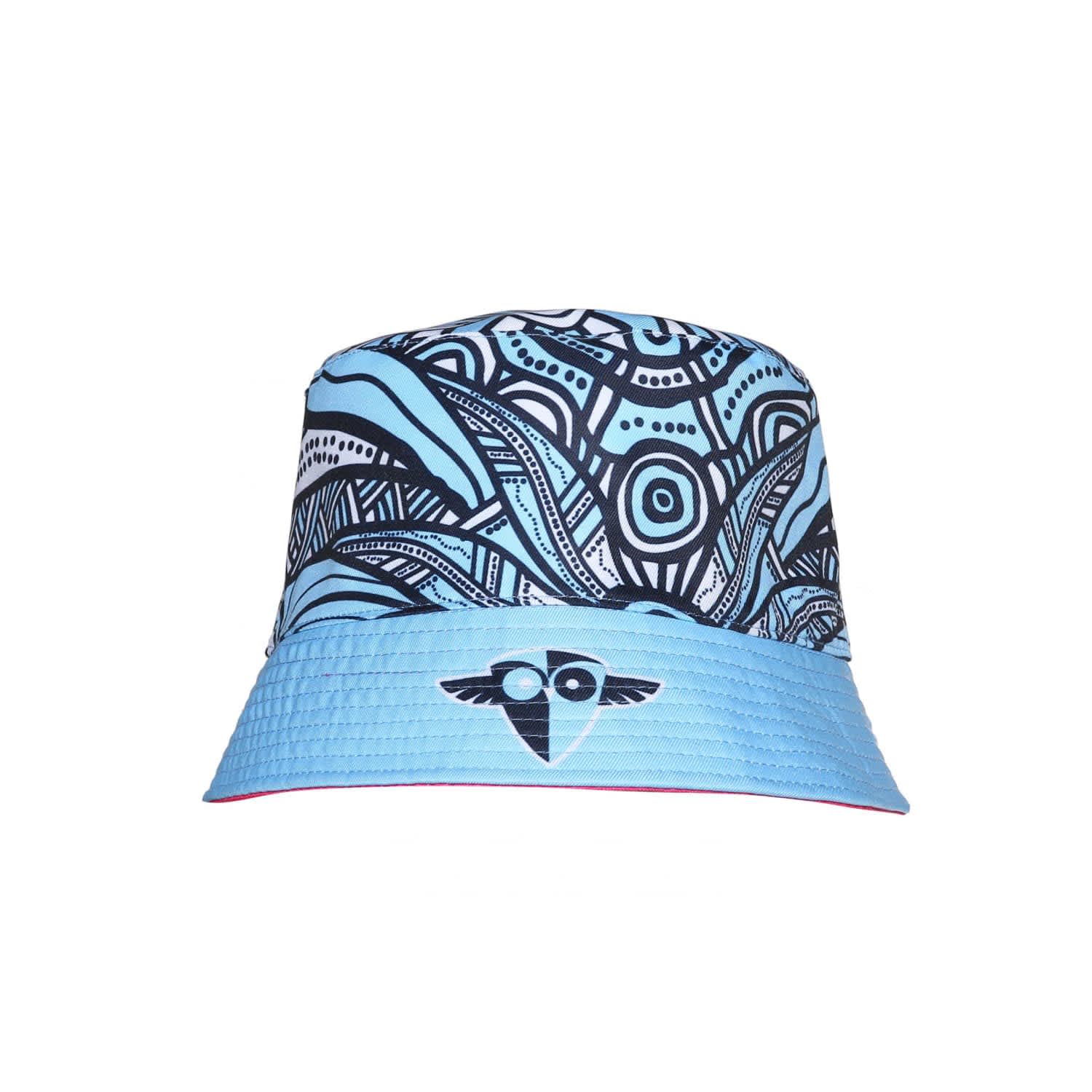 A reversible bucket hat featuring a blue and black abstract design, with a logo on the front.