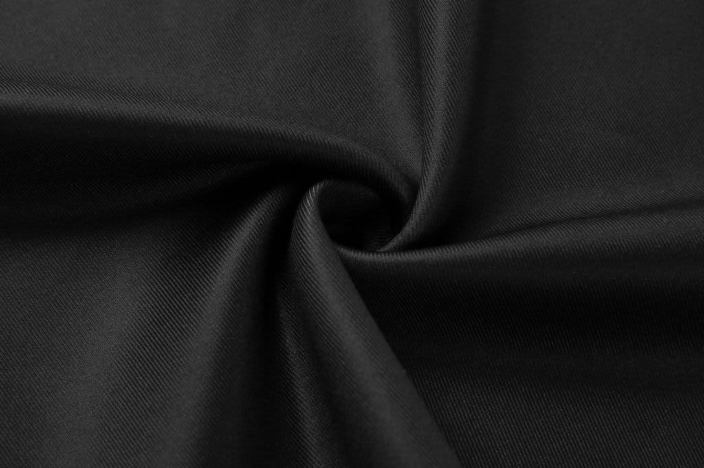 A black fabric with a smooth texture, tightly woven and displaying a slight sheen.