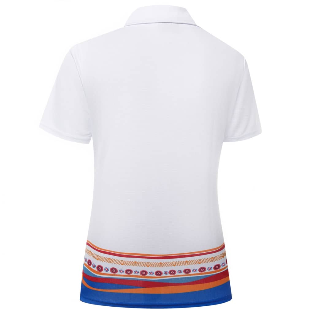 A white polo shirt with a colourful patterned design along the hem, featuring red, orange, and blue stripes.