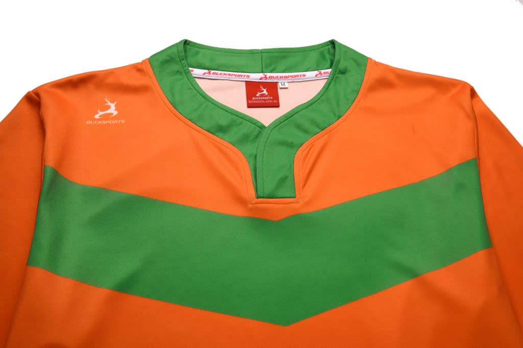 A drink bottle in vibrant orange with a green chevron pattern and a logo on the upper left.