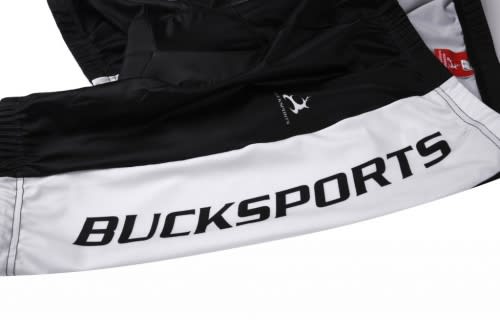 A black and white sports jersey featuring a logo and the word "BUCKSPORTS" on one sleeve.
