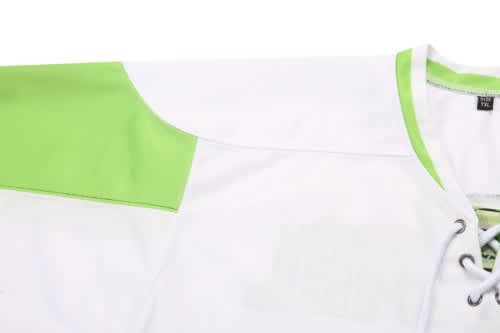 An ice hockey racing suit in white with bright green accents, featuring a lace-up neckline and logo.