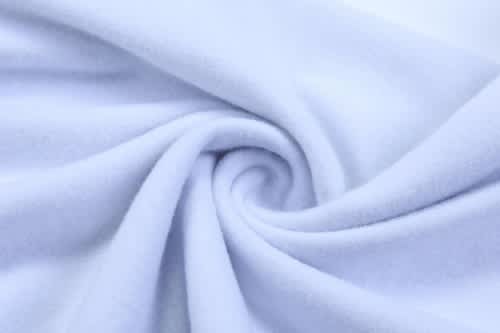 A swirl of soft, light blue fabric, featuring a smooth texture suitable for sportswear.