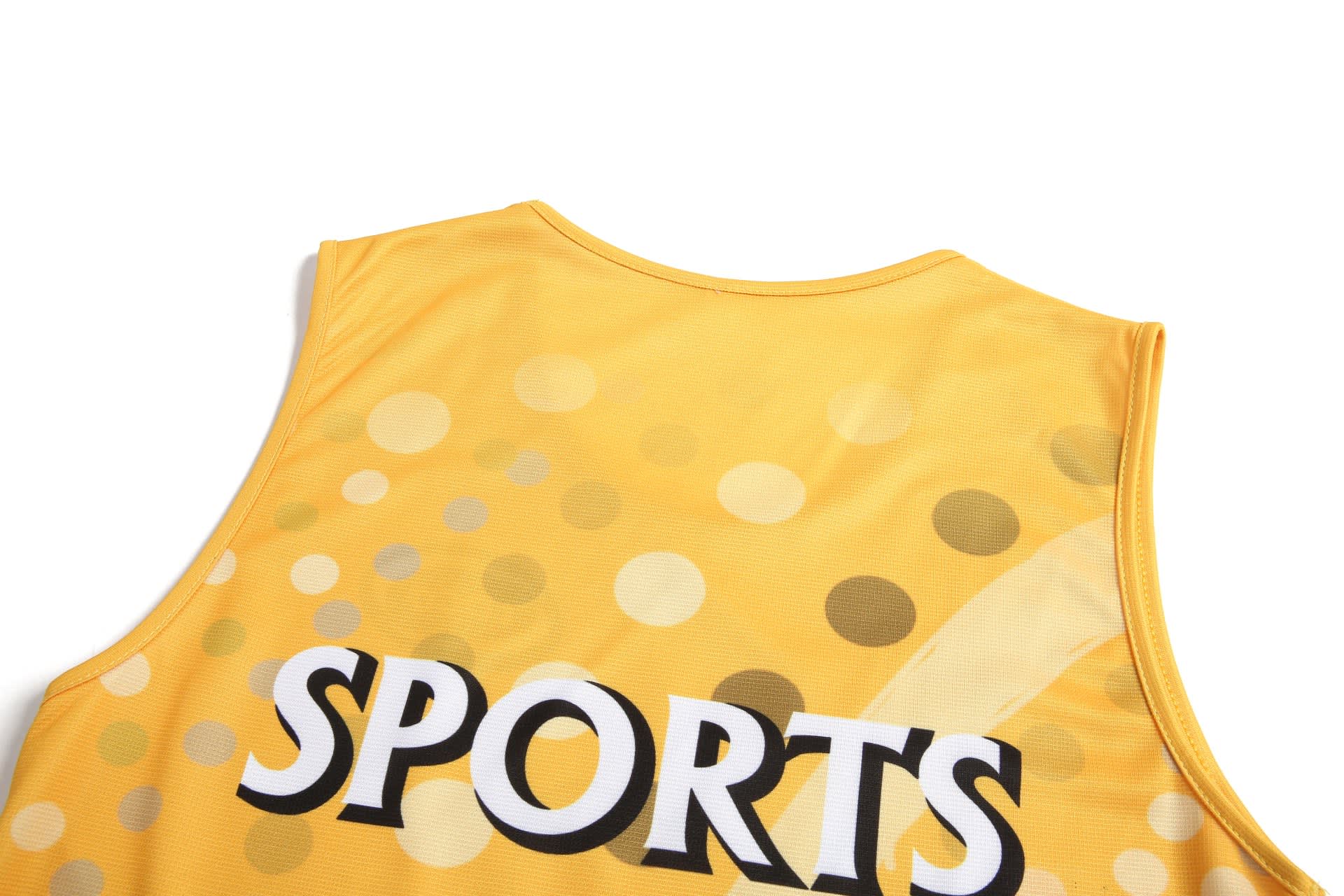 A yellow sports singlet featuring a dotted pattern and a logo, with "SPORTS" prominently displayed on the back.