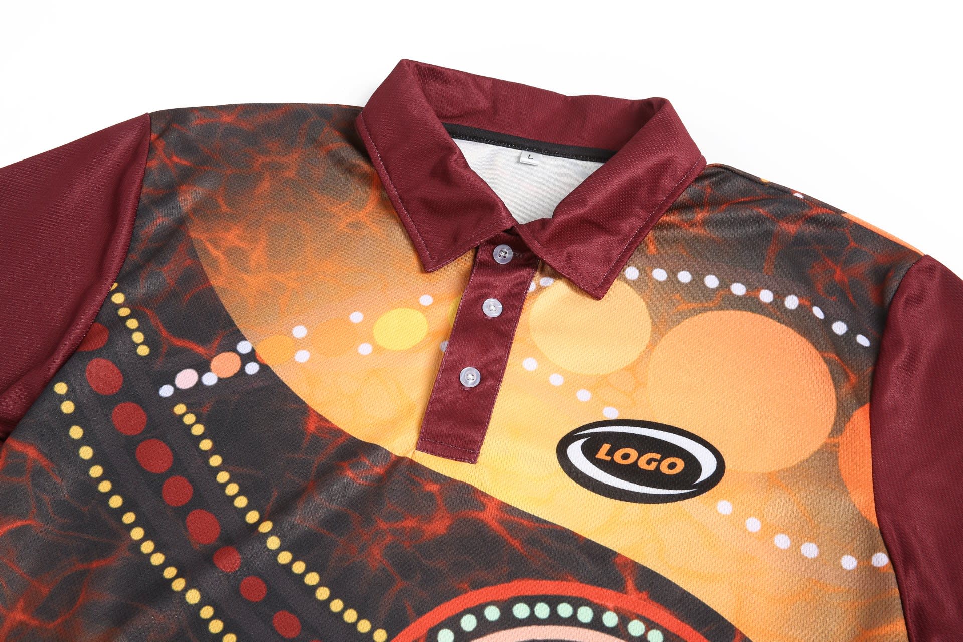 A customised Aboriginal polo shirt in vibrant orange, red, and black tones, featuring a collar and logo.
