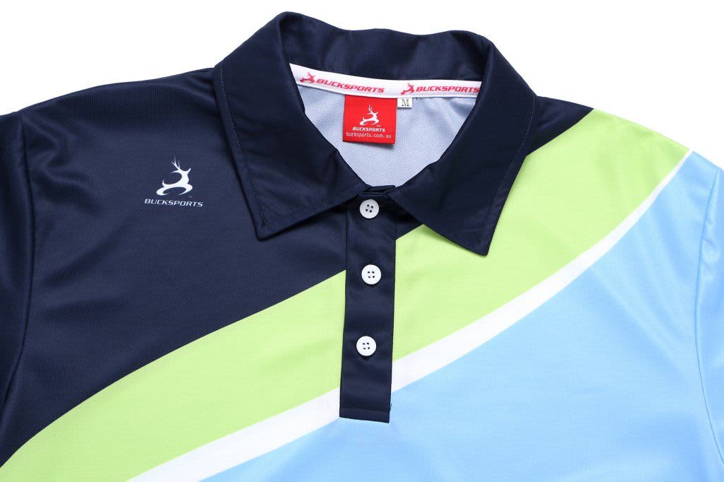A polo shirt in blue, green, and navy with a branded logo on the chest and a button-up collar.