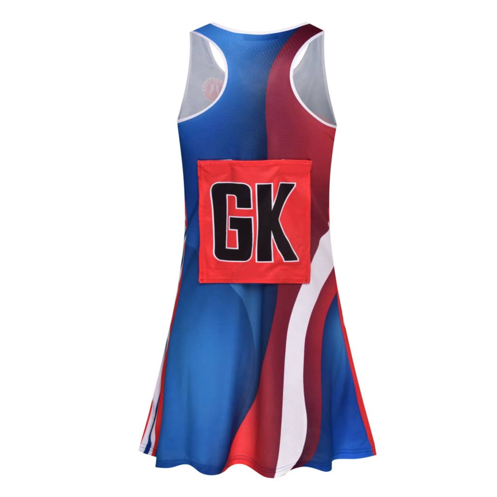 A sports dress for netball in blue and red, featuring a large red panel with the initials "GK" on the back.