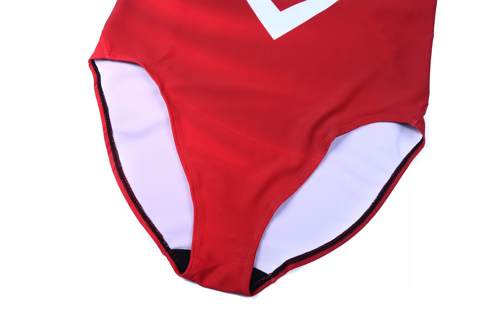 A red swimming one-piece with a smooth texture and a white logo, featuring a high-cut leg design.