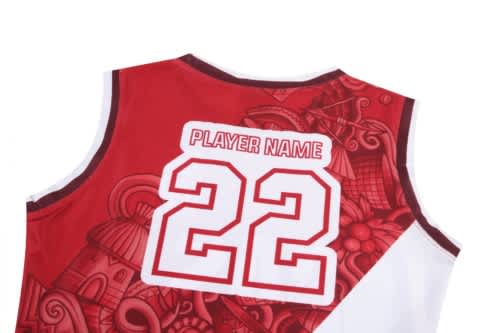 A red and white basketball uniform jersey featuring intricate designs and a number 22 on the back, with a logo.