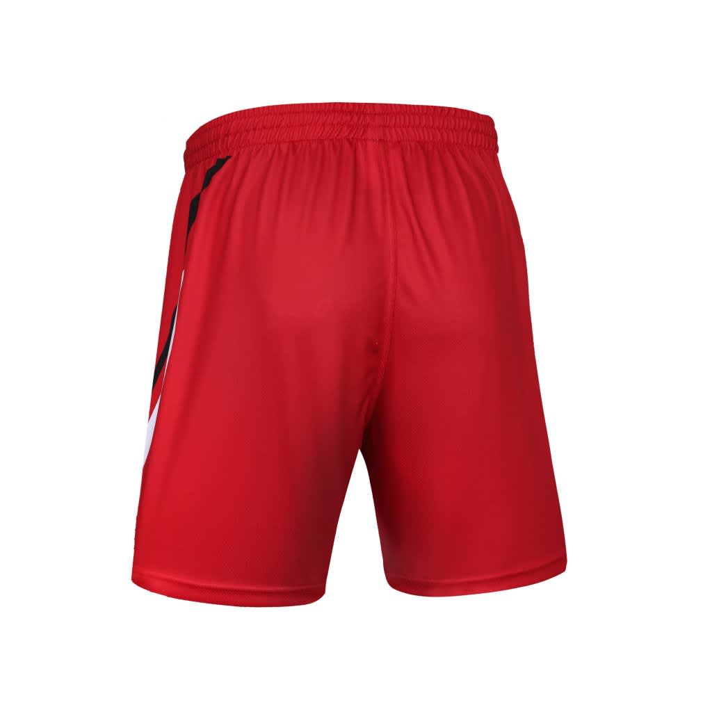 Red shorts featuring a black and white design, with an elastic waistband and no visible branding.