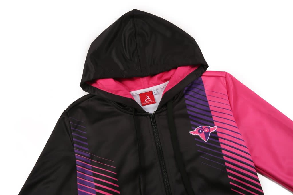 A women's hoodie jacket featuring a black and pink design with a logo on the front.