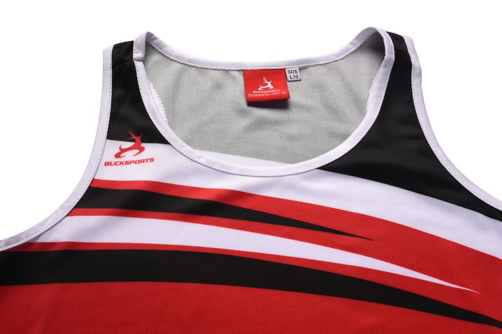 A promotional singlet in red, black, and white with a logo on the upper side.