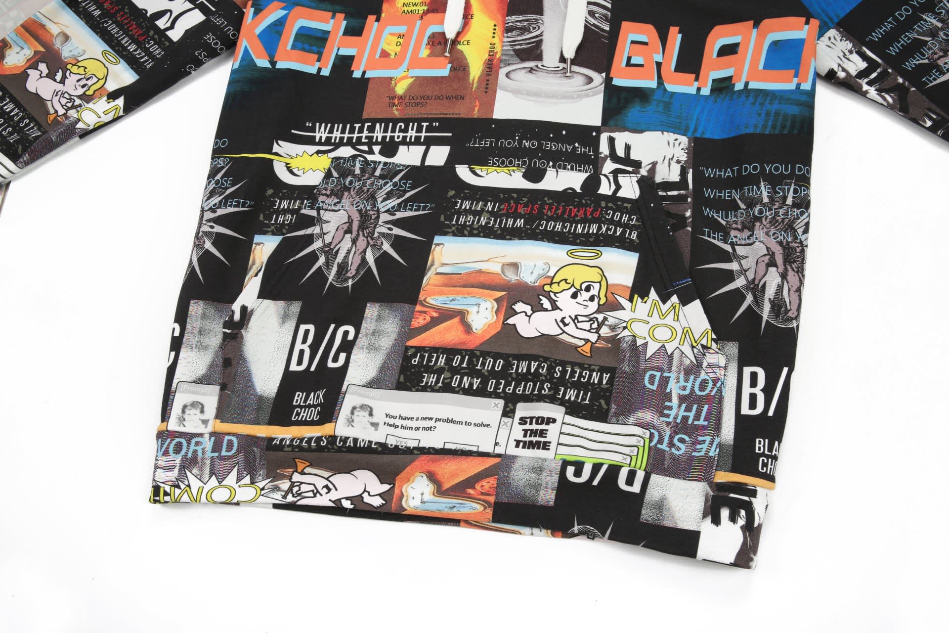 A hoodie featuring a colourful, graphic print with various designs and text, including a logo.
