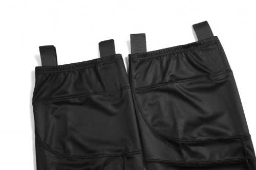 A black ice hockey racing suit featuring adjustable straps and a sleek design, with a logo on one side.
