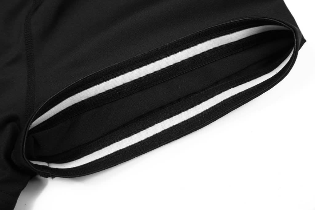 Netball antislope shorts in black, featuring white detailing along the waistband. The shorts have a smooth texture.