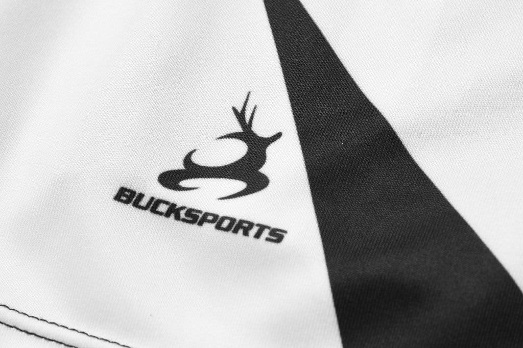 A black and white sports jersey with a logo and sleek design details. Suitable for a bowling team uniform.