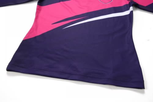 A sports dress featuring a purple body with pink and white accents, designed for swimming and anti-chlorine protection.