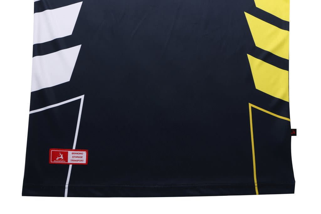 A PLAYER SINGLET featuring a dark background with yellow and white accents, and a small logo.