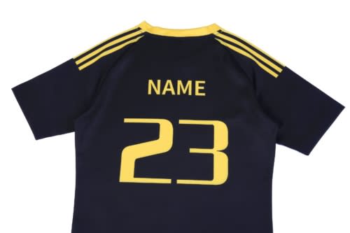 A navy blue hoodie with yellow accents, featuring a logo and the number 23 on the back.
