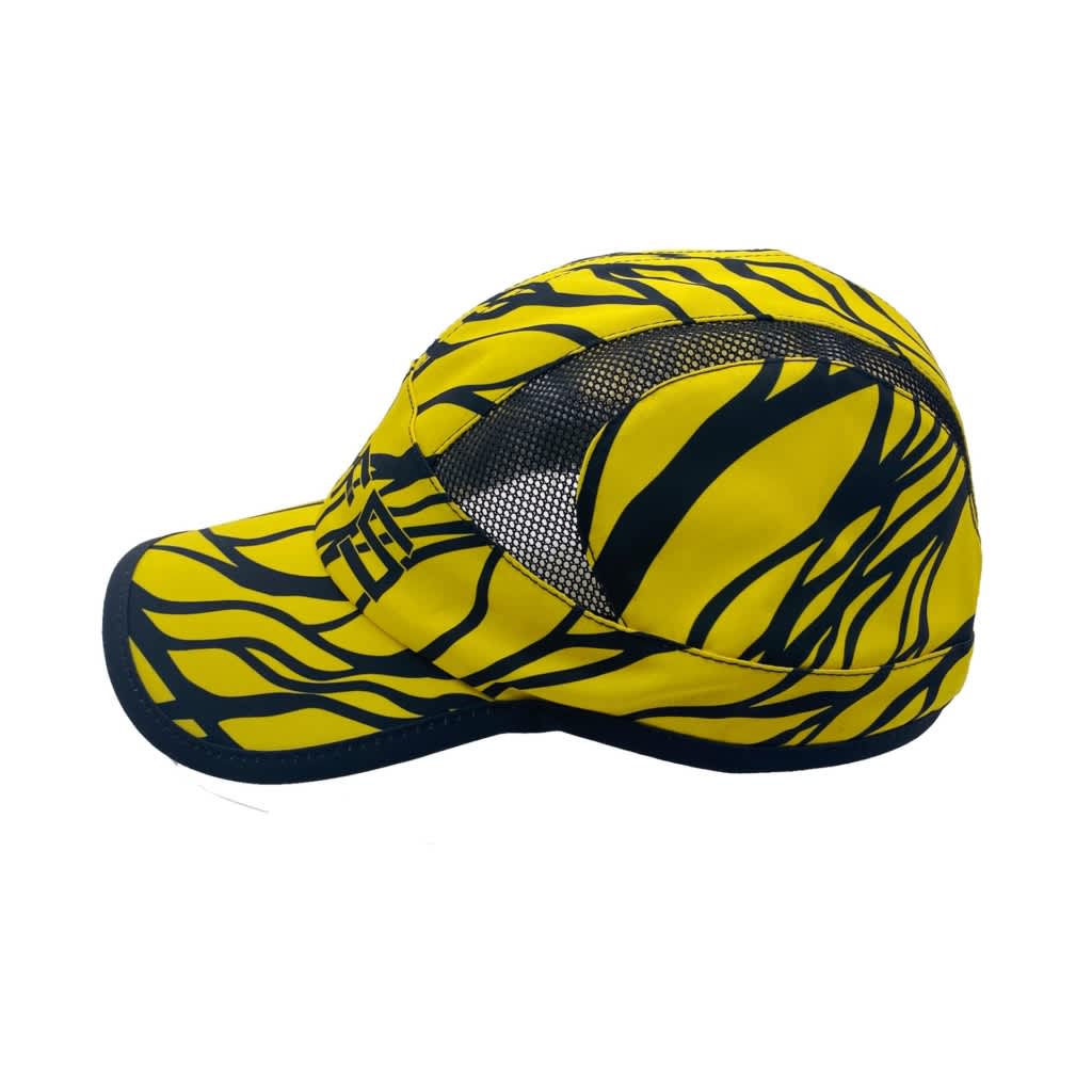A yellow and navy patterned cap with mesh panels and a logo on the side.