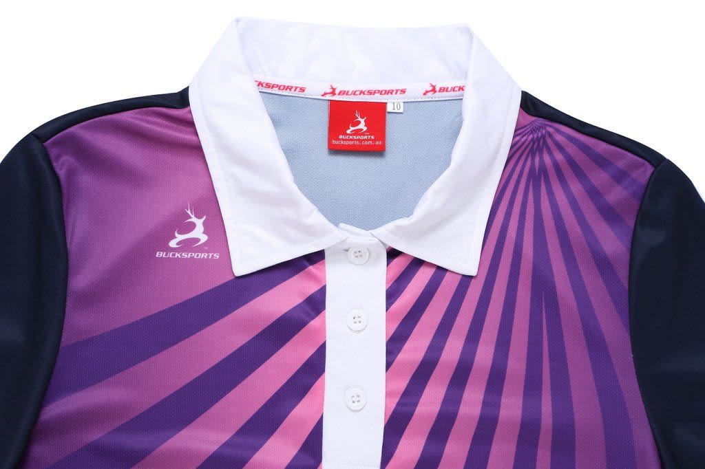 A polo shirt in shades of purple with a white collar and a logo on the chest.