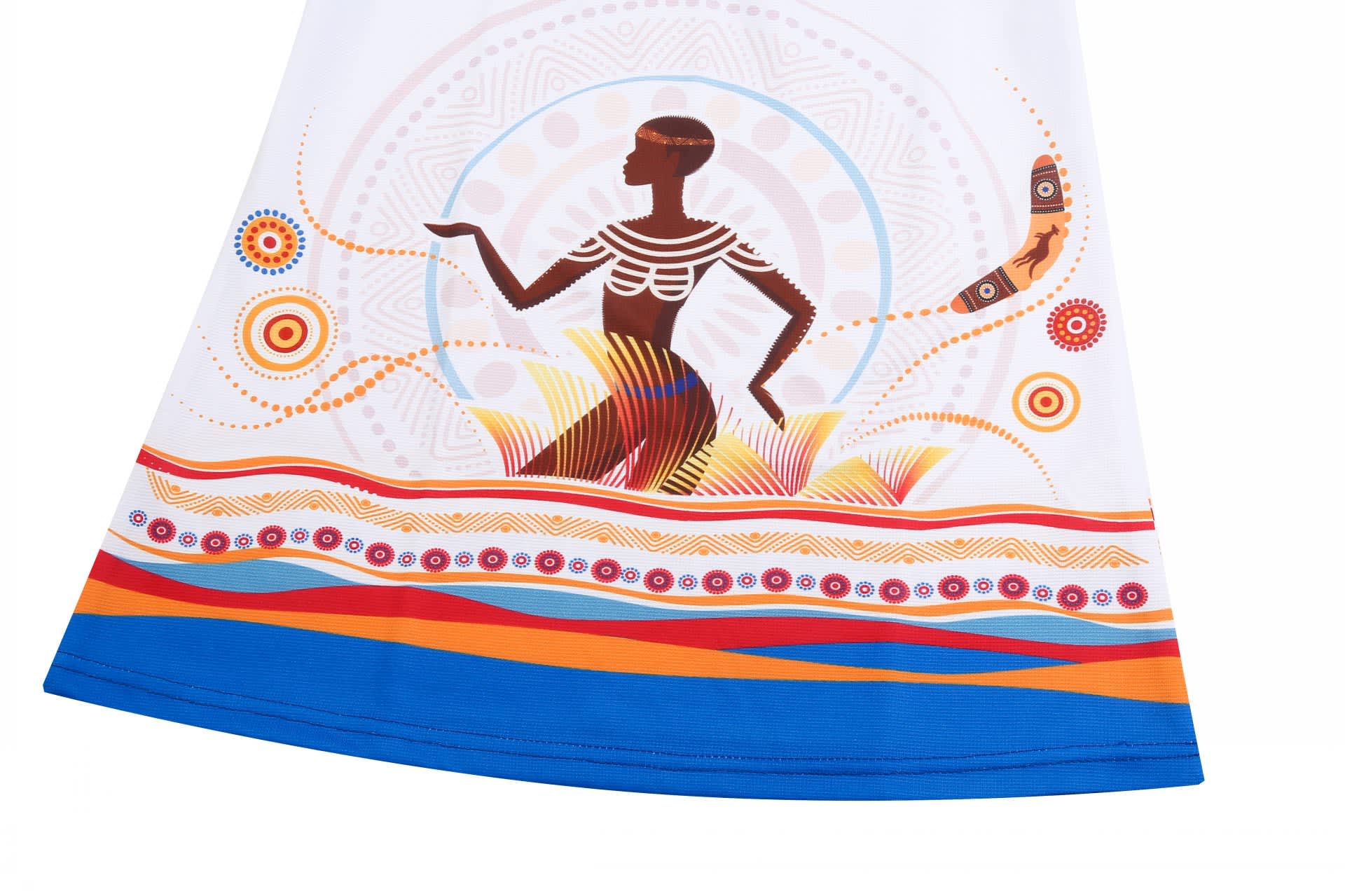 A patterned fabric featuring a silhouette of a woman with vibrant orange, blue, and earthy tones. It includes artistic designs.