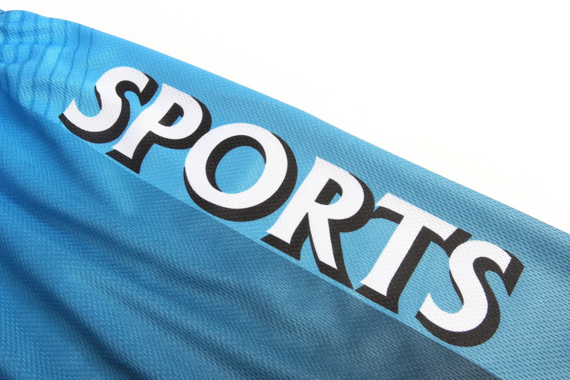 A blue sports uniform featuring the word "SPORTS" prominently displayed, with a logo present.