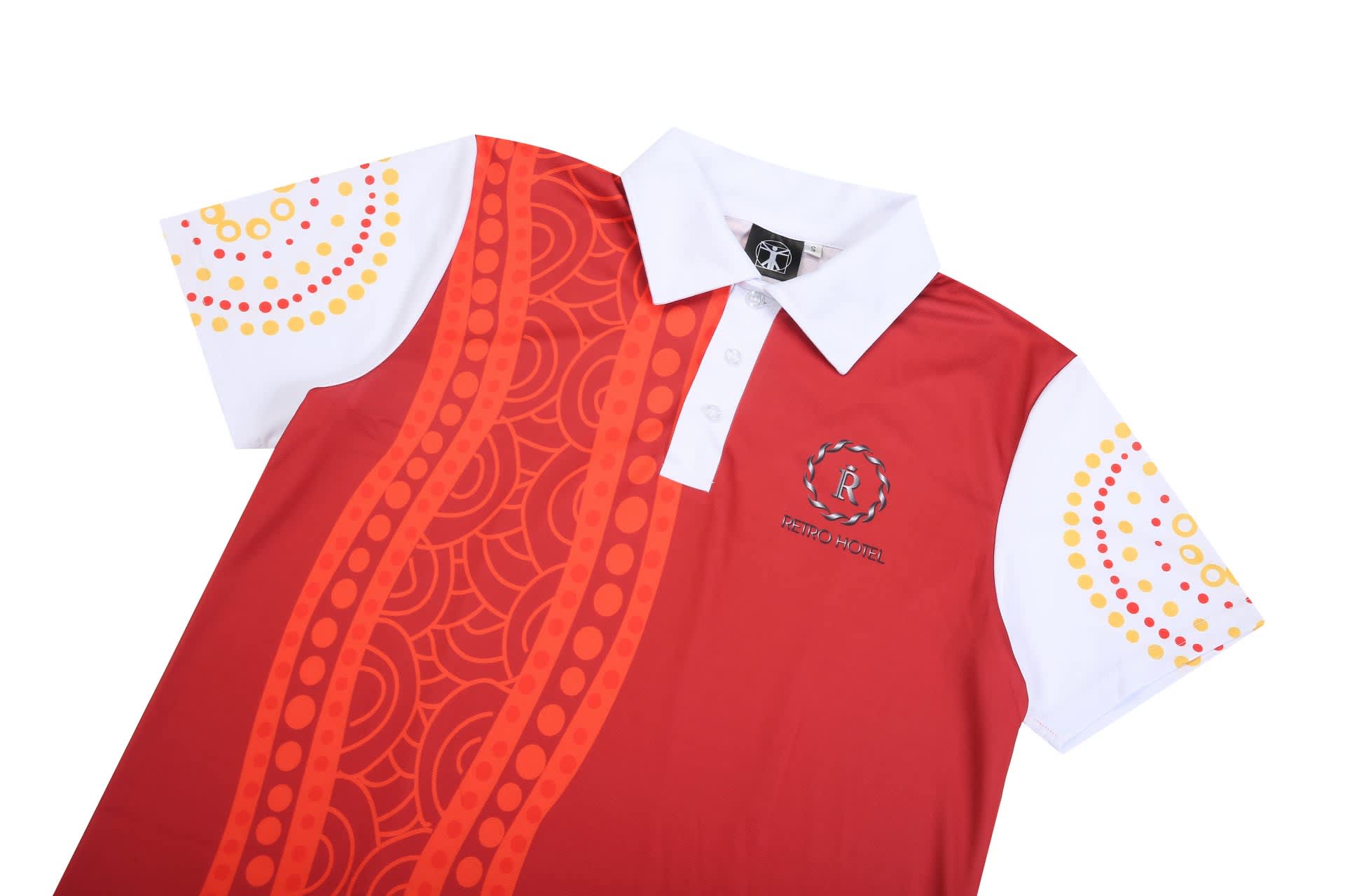 A red and white polo shirt featuring a patterned design and a logo, with a collar and short sleeves.