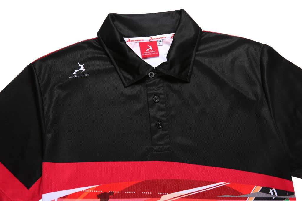 A black and red collared darts club shirt with a logo and distinctive graphic design on the front.