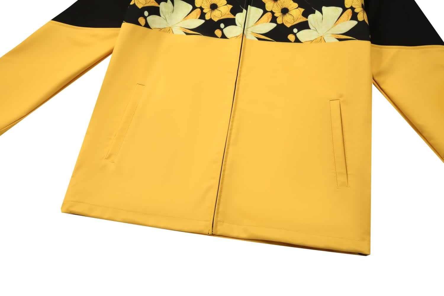 A yellow and black t-shirt jersey with floral patterns and two side pockets, featuring a logo.