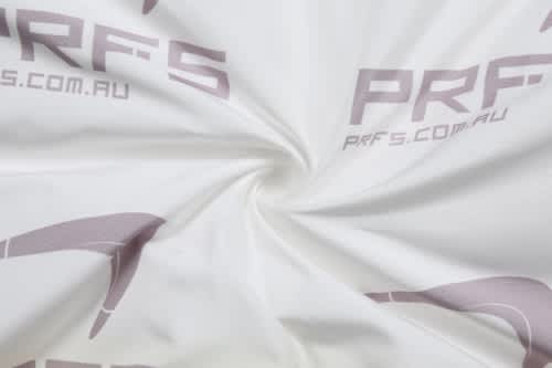 A swirl of white fabric featuring a subtle logo pattern. The texture appears soft and smooth.