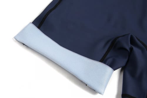 A navy rowing uniform suit featuring a light blue textured cuff and black detailing. It includes a logo on the fabric.