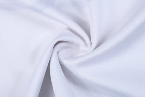 A white sports singlet made from smooth fabric, featuring a logo and designed for athletic wear.