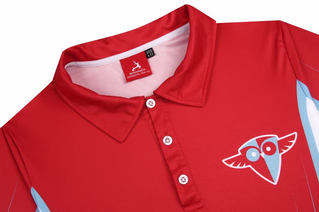A red polo shirt with a collar, featuring blue accents and a logo on the left chest area.