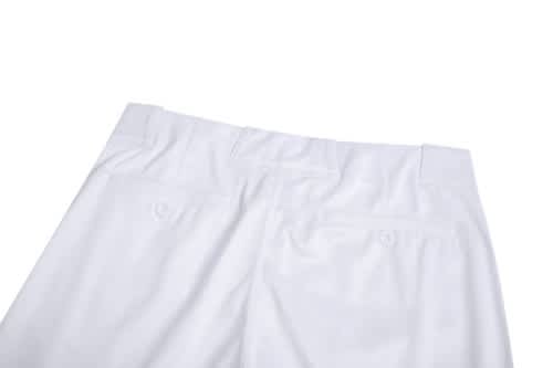 A pair of white sports shorts with pockets at the back, featuring stitching details and a simple design.