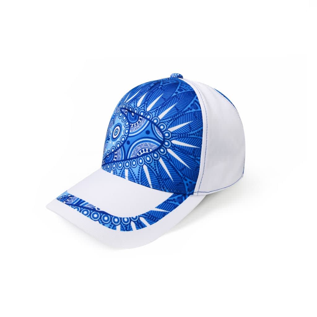 A blue and white sublimated sport cap featuring intricate tribal patterns and a logo.