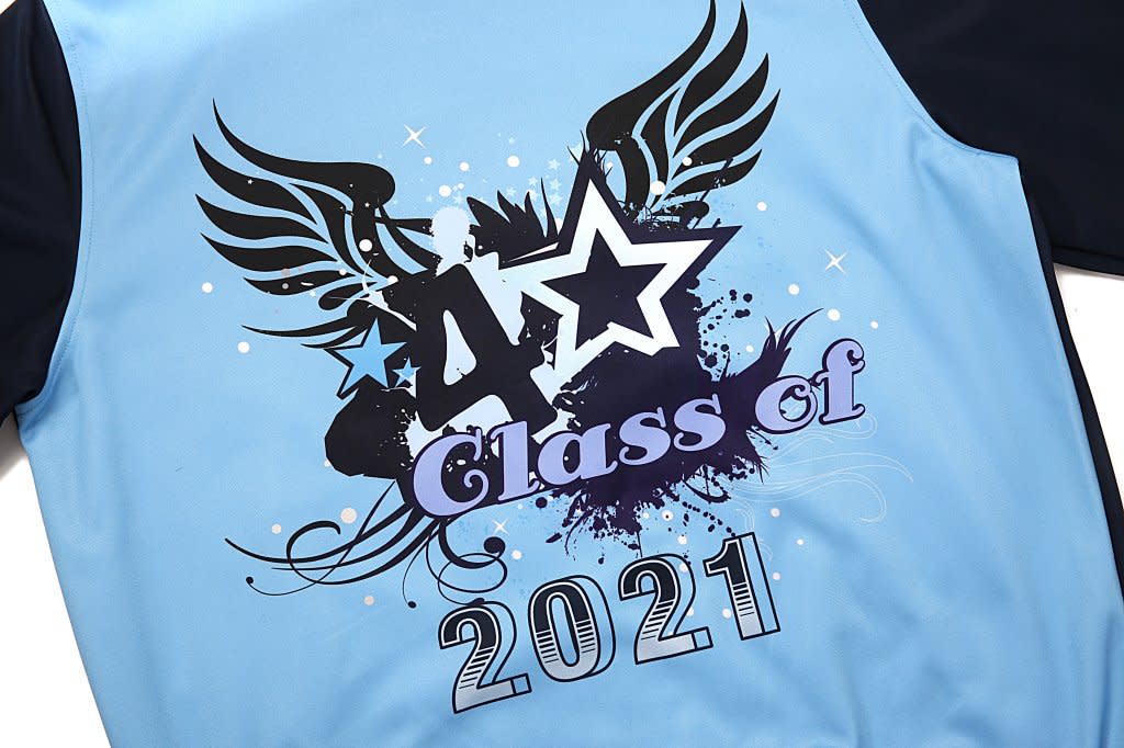 A light blue leavers jacket featuring graphic designs, including stars and wings, with "Class of 2021."