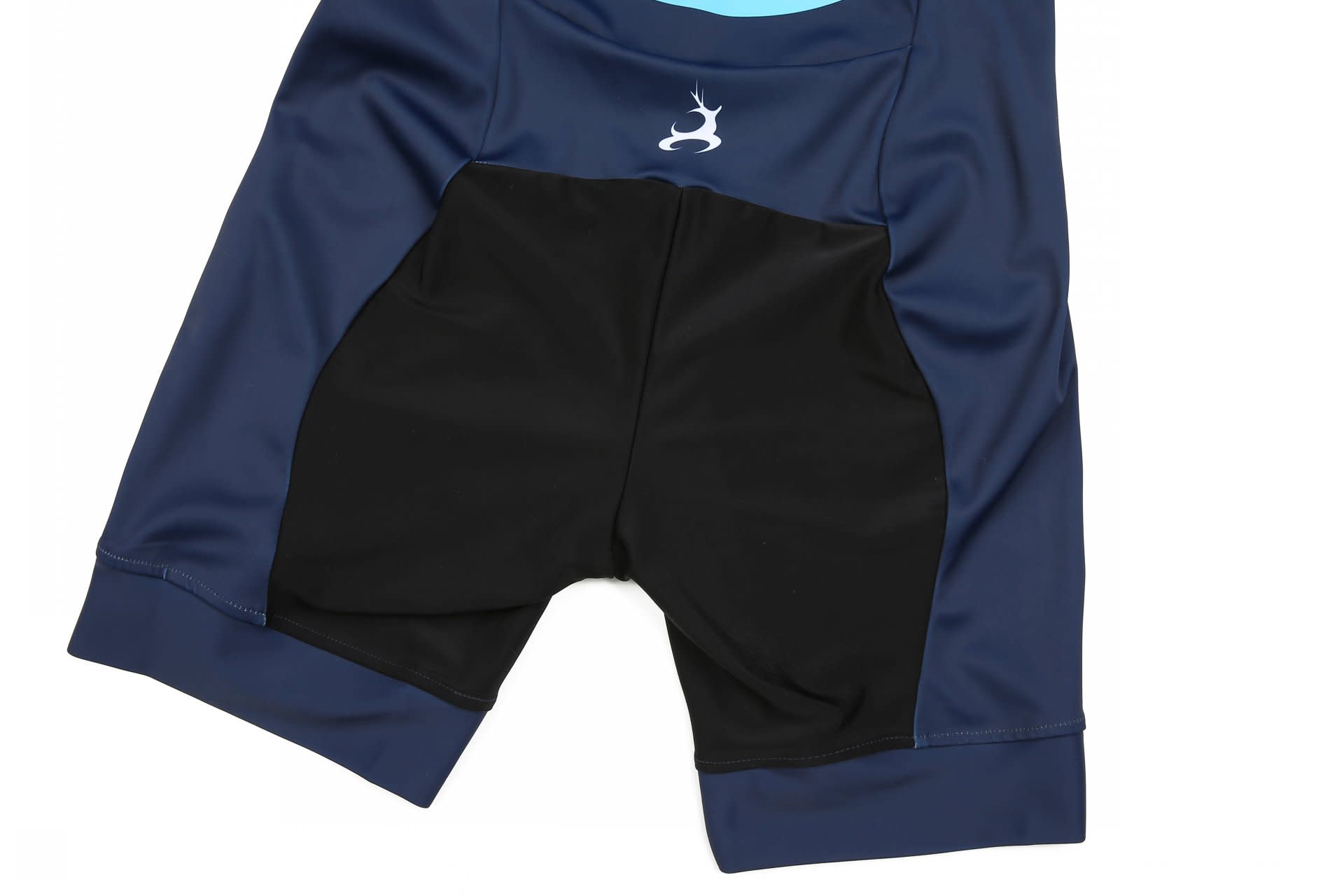 A speed skating suit in navy blue and black, featuring a logo and a fitted design for performance.