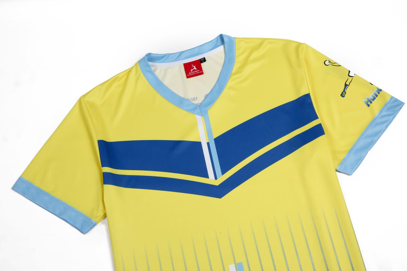 A yellow handball jersey featuring blue stripes and accents, with a logo on one sleeve.