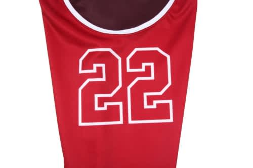 A red sports jersey featuring a large white number 22, designed for hockey team wear.