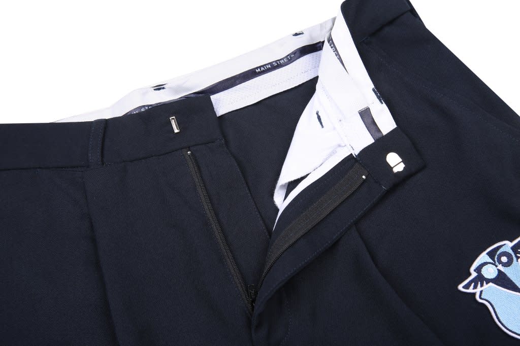 A dark blue lawn bowling uniform featuring a zippered fly and an embroidered logo on the side.